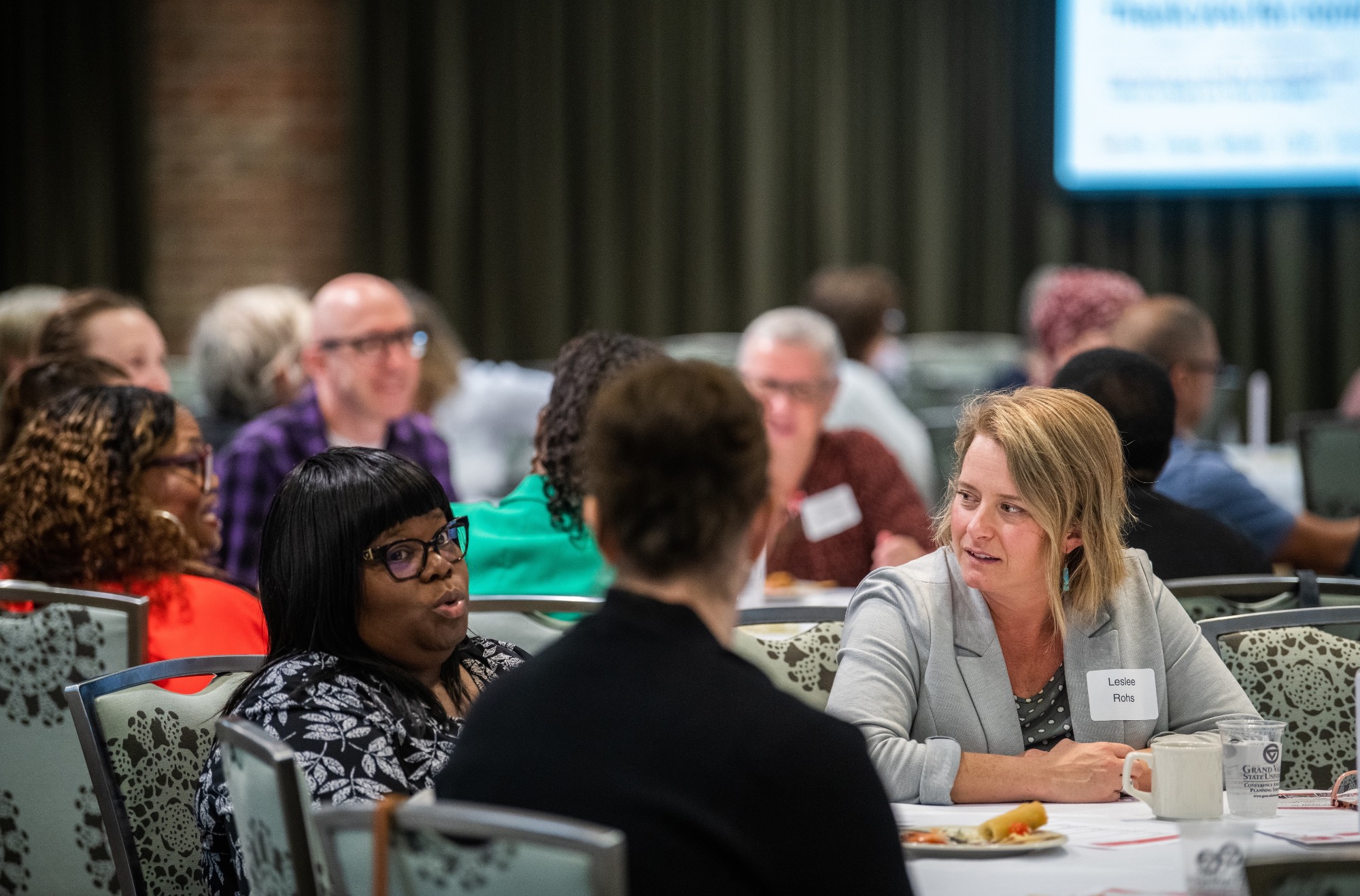 People talking at a table